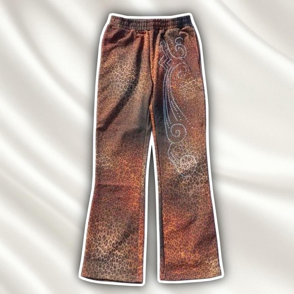 PRAYING cheetah print rhinestone flare sweatpants